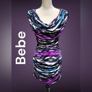 Bebe-XS Bodycon dress w/cutouts & mesh above hips. Great colors/rouching!  EUC!